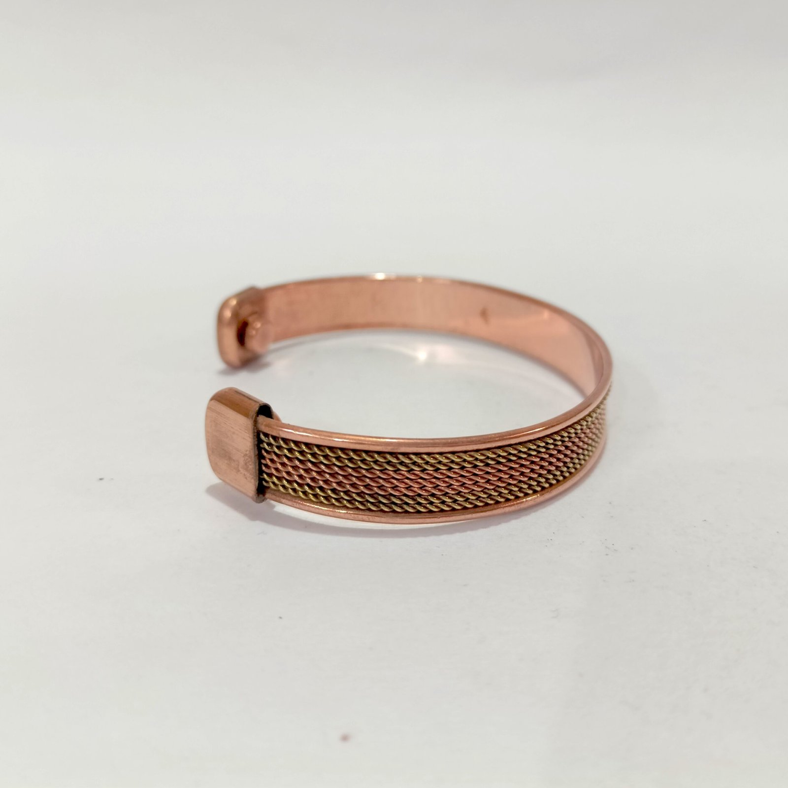 RB ARTISAN Copper Brass Magnetic Cuff Bracelet – Multi Row Twisted Wire Mesh RB ARTISAN handcrafted copper brass two tone magnetic cuff bracelet multi row twisted wire mesh dense texture embedded magnets made in India